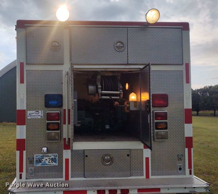 image for item DE7028 1996 Freightliner FL80  E-One heavy wet rescue fire truck