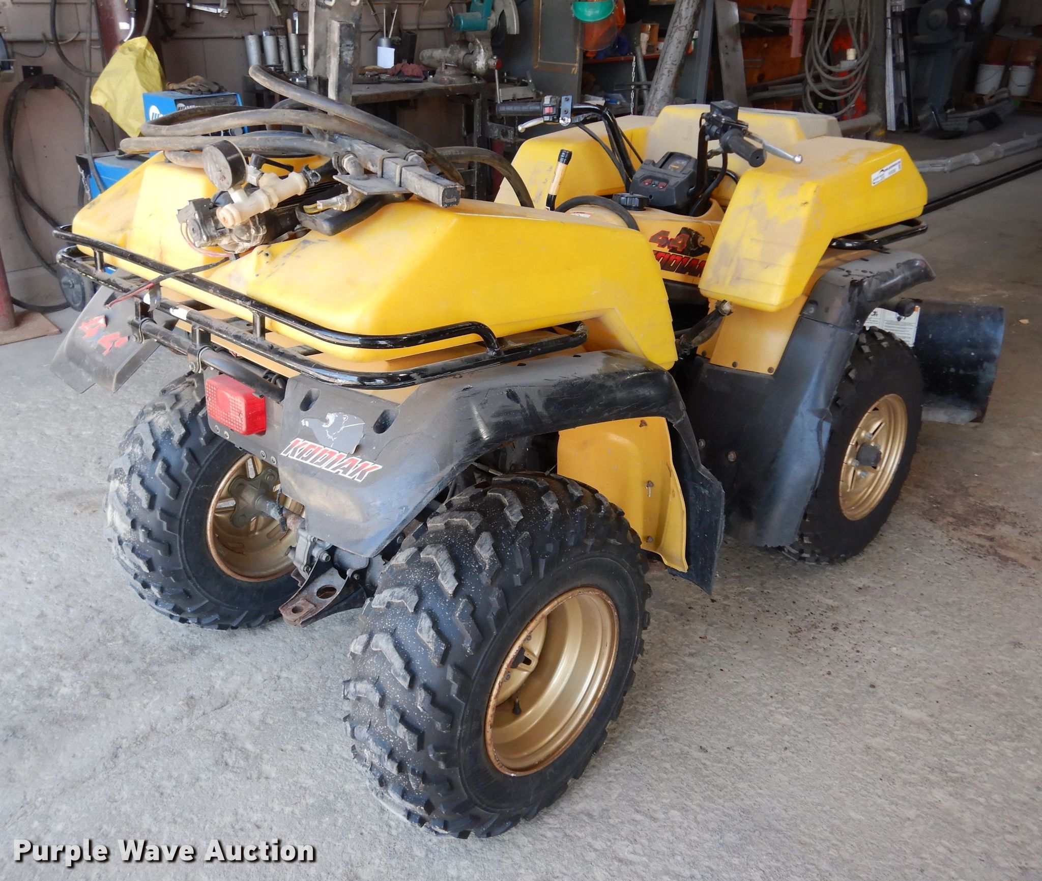 1995 Kodiak 400 ATV in Junction City, KS Item HV9393 sold Purple Wave