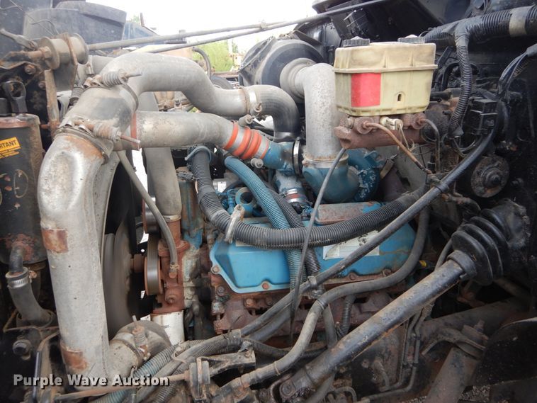 image for item DH5133 1999 International 4700  flatbed truck