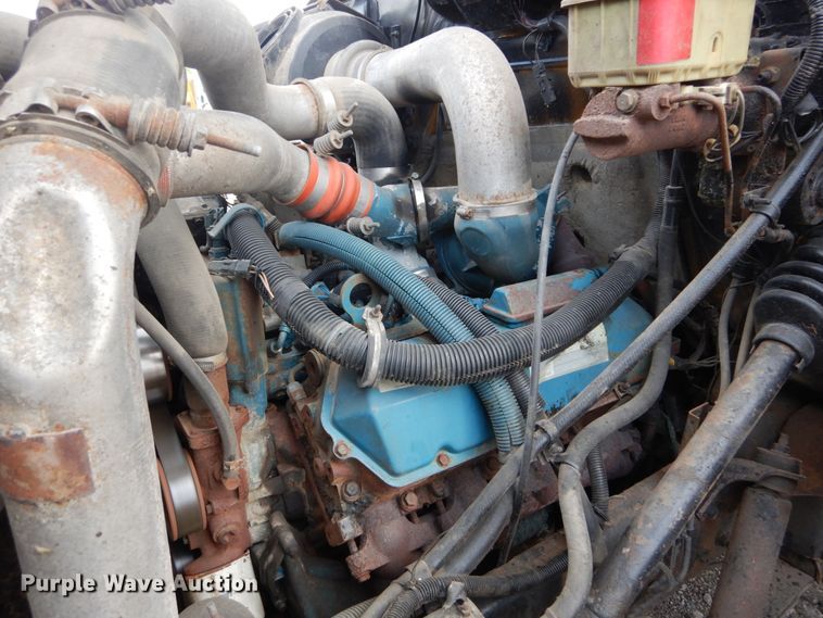 image for item DH5133 1999 International 4700  flatbed truck