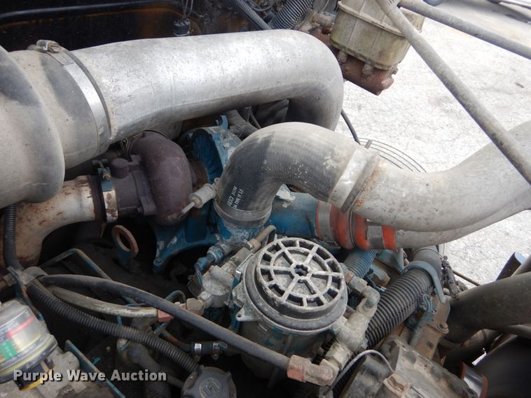 image for item DH5133 1999 International 4700  flatbed truck