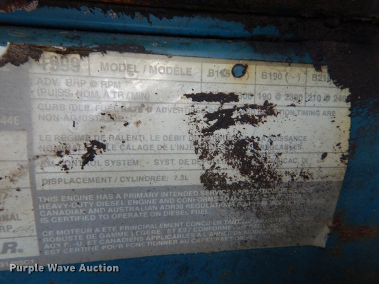 image for item DH5133 1999 International 4700  flatbed truck