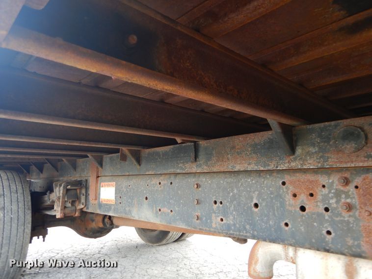 image for item DH5133 1999 International 4700  flatbed truck