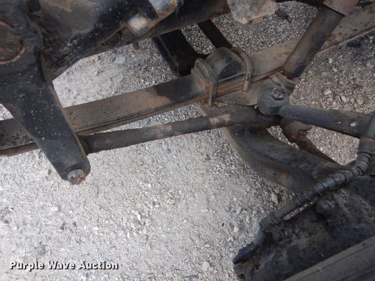 image for item DH5133 1999 International 4700  flatbed truck