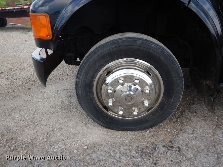 image for item DH5133 1999 International 4700  flatbed truck