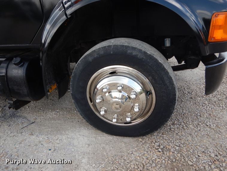 image for item DH5133 1999 International 4700  flatbed truck