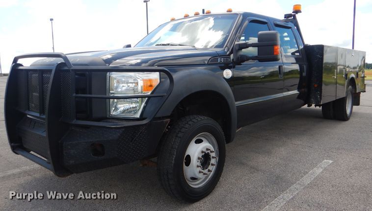 image for item GY9879 2012 Ford F550 Super Duty  Crew Cab utility bed truck with crane