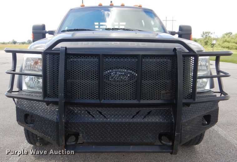 image for item GY9879 2012 Ford F550 Super Duty  Crew Cab utility bed truck with crane