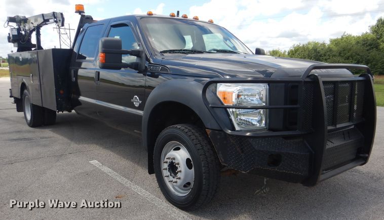 image for item GY9879 2012 Ford F550 Super Duty  Crew Cab utility bed truck with crane