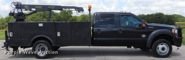 image for item GY9879 2012 Ford F550 Super Duty  Crew Cab utility bed truck with crane