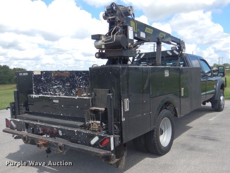 image for item GY9879 2012 Ford F550 Super Duty  Crew Cab utility bed truck with crane