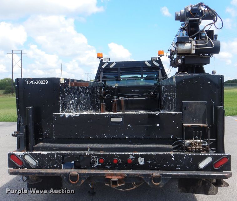 image for item GY9879 2012 Ford F550 Super Duty  Crew Cab utility bed truck with crane