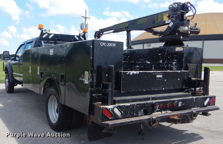 image for item GY9879 2012 Ford F550 Super Duty  Crew Cab utility bed truck with crane