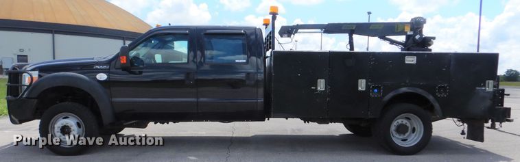 image for item GY9879 2012 Ford F550 Super Duty  Crew Cab utility bed truck with crane