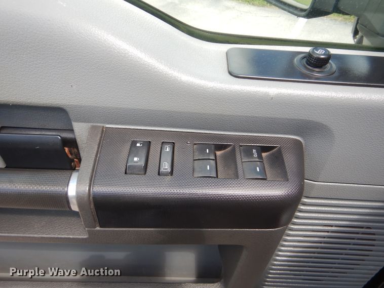 image for item GY9879 2012 Ford F550 Super Duty  Crew Cab utility bed truck with crane