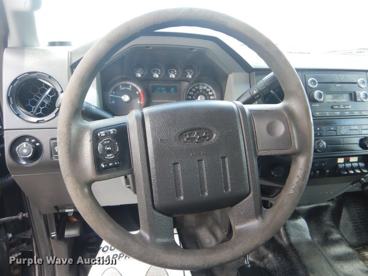 image for item GY9879 2012 Ford F550 Super Duty  Crew Cab utility bed truck with crane