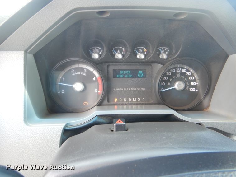 image for item GY9879 2012 Ford F550 Super Duty  Crew Cab utility bed truck with crane