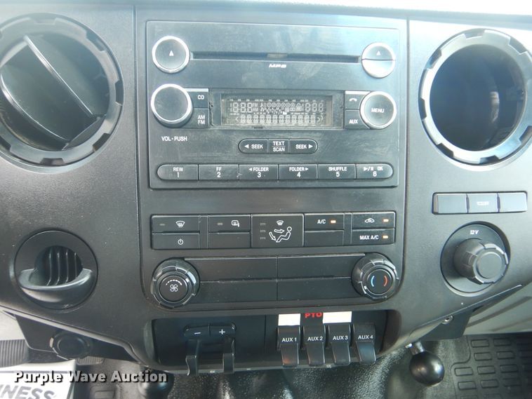 image for item GY9879 2012 Ford F550 Super Duty  Crew Cab utility bed truck with crane