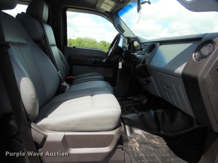 image for item GY9879 2012 Ford F550 Super Duty  Crew Cab utility bed truck with crane