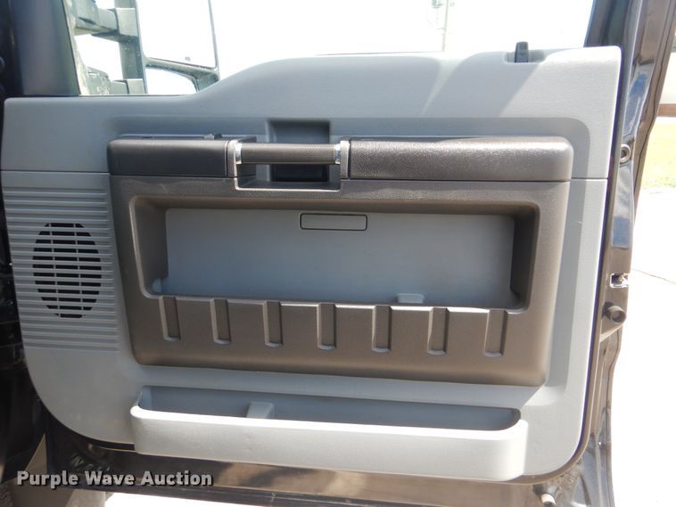 image for item GY9879 2012 Ford F550 Super Duty  Crew Cab utility bed truck with crane