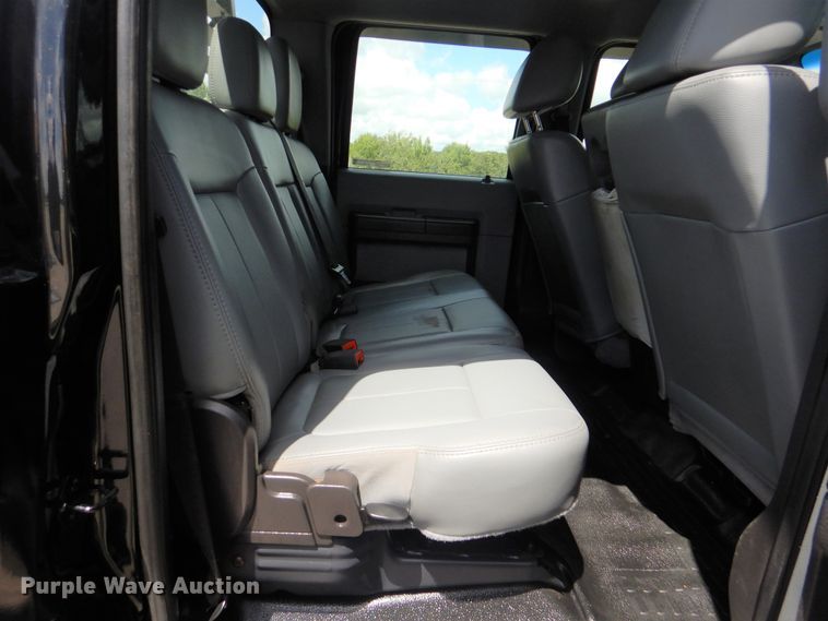 image for item GY9879 2012 Ford F550 Super Duty  Crew Cab utility bed truck with crane