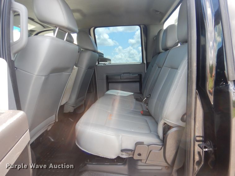 image for item GY9879 2012 Ford F550 Super Duty  Crew Cab utility bed truck with crane