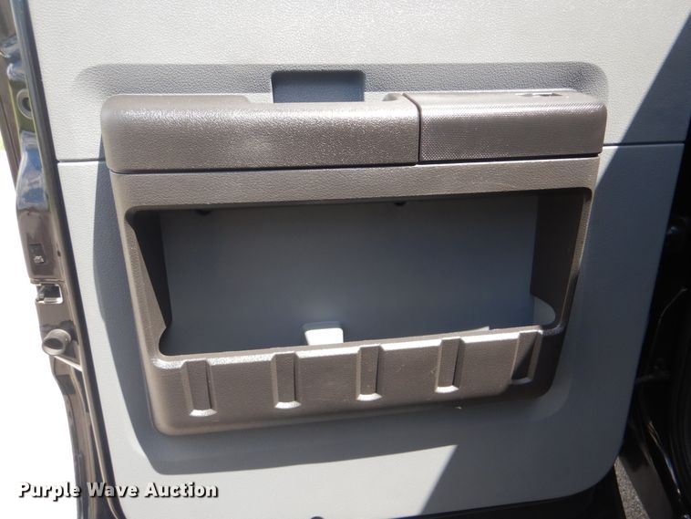 image for item GY9879 2012 Ford F550 Super Duty  Crew Cab utility bed truck with crane