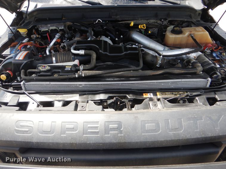 image for item GY9879 2012 Ford F550 Super Duty  Crew Cab utility bed truck with crane