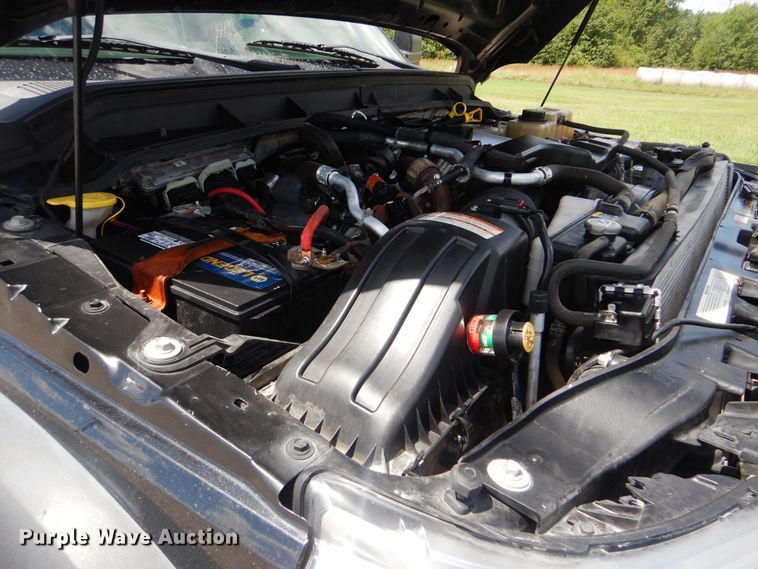 image for item GY9879 2012 Ford F550 Super Duty  Crew Cab utility bed truck with crane