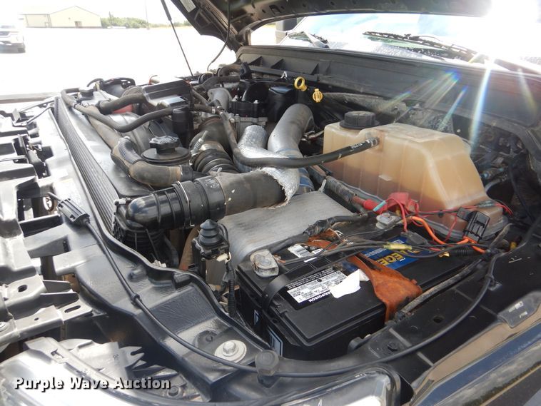 image for item GY9879 2012 Ford F550 Super Duty  Crew Cab utility bed truck with crane