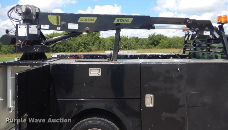 image for item GY9879 2012 Ford F550 Super Duty  Crew Cab utility bed truck with crane