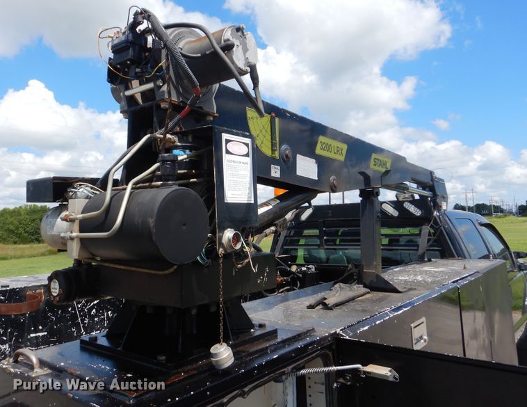 image for item GY9879 2012 Ford F550 Super Duty  Crew Cab utility bed truck with crane