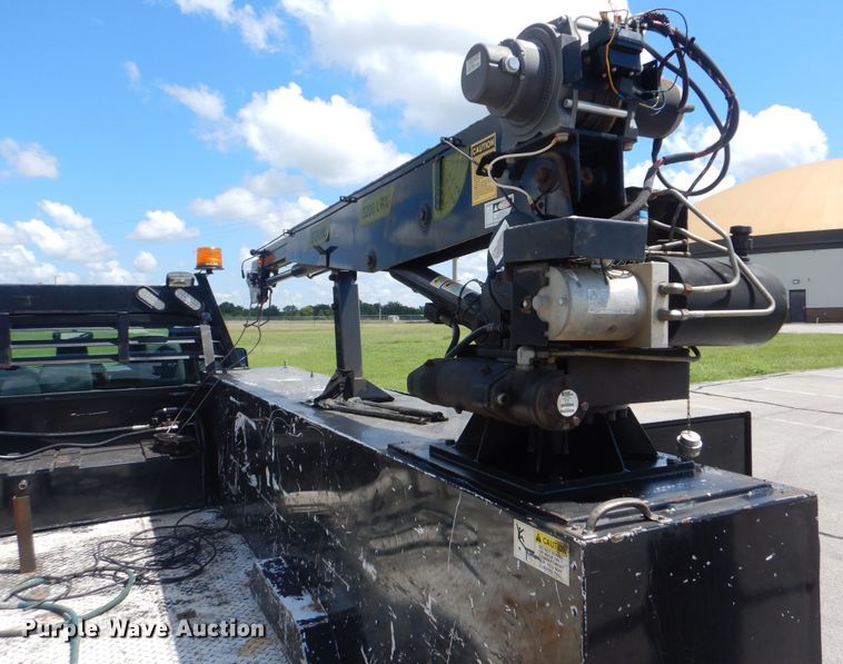 image for item GY9879 2012 Ford F550 Super Duty  Crew Cab utility bed truck with crane