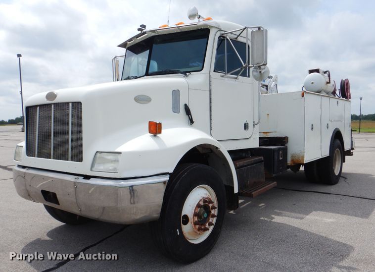 image for item HJ9827 1995 Peterbilt 330  utility bed truck with crane