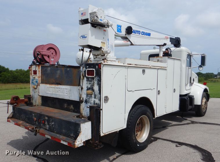 image for item HJ9827 1995 Peterbilt 330  utility bed truck with crane