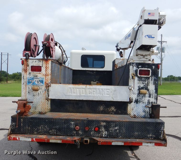 image for item HJ9827 1995 Peterbilt 330  utility bed truck with crane