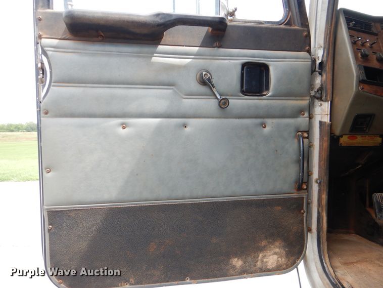 image for item HJ9827 1995 Peterbilt 330  utility bed truck with crane