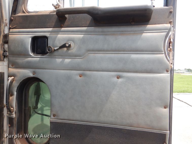 image for item HJ9827 1995 Peterbilt 330  utility bed truck with crane