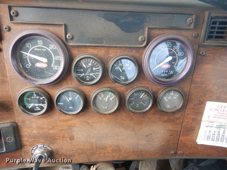 image for item HJ9827 1995 Peterbilt 330  utility bed truck with crane