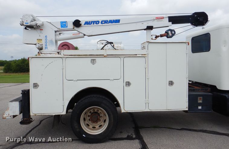 image for item HJ9827 1995 Peterbilt 330  utility bed truck with crane