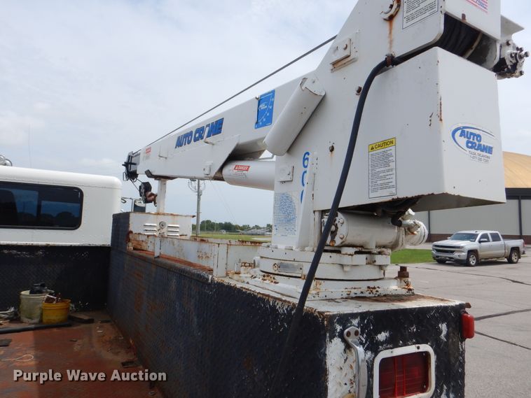 image for item HJ9827 1995 Peterbilt 330  utility bed truck with crane