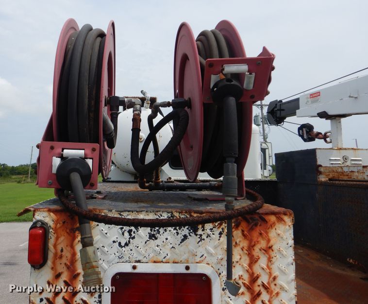 image for item HJ9827 1995 Peterbilt 330  utility bed truck with crane