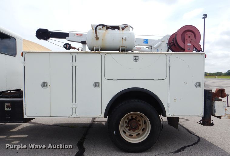 image for item HJ9827 1995 Peterbilt 330  utility bed truck with crane