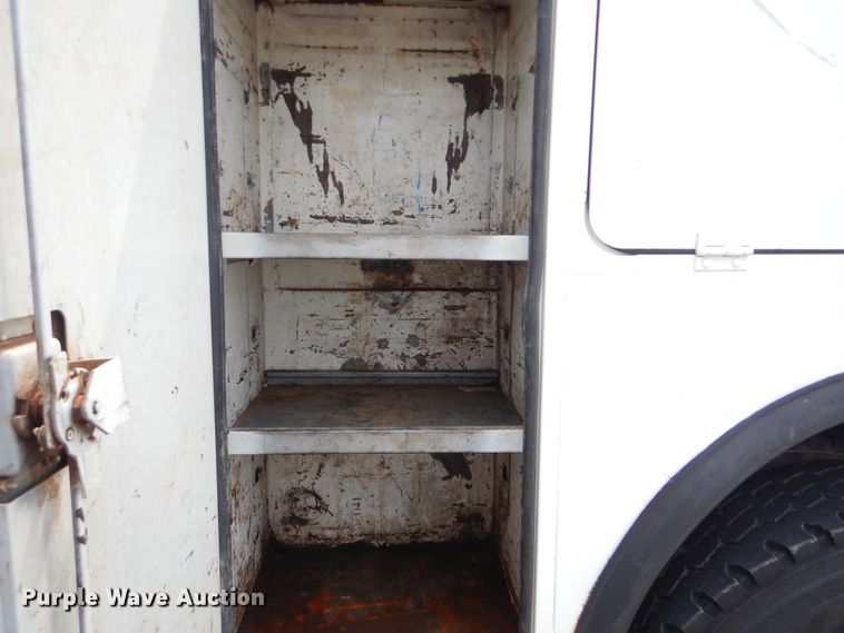 image for item HJ9827 1995 Peterbilt 330  utility bed truck with crane