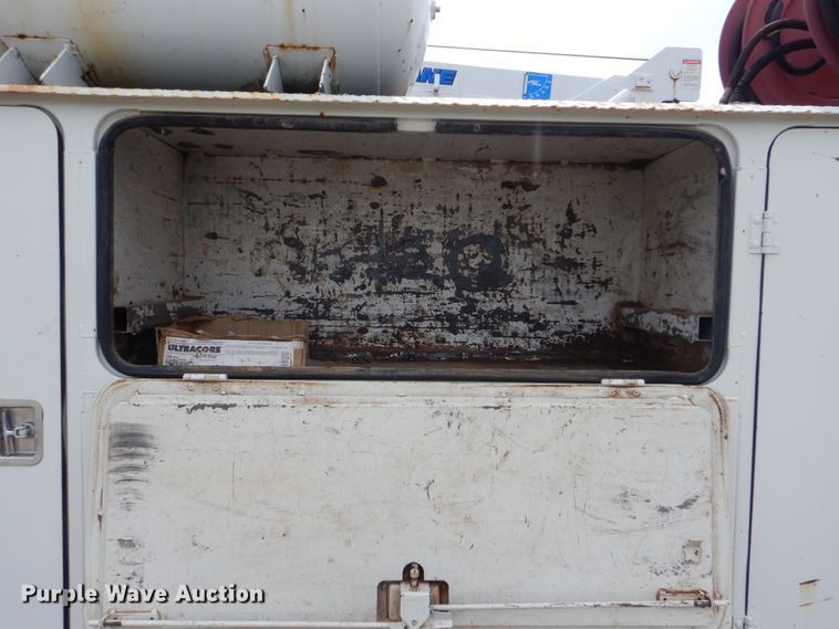 image for item HJ9827 1995 Peterbilt 330  utility bed truck with crane