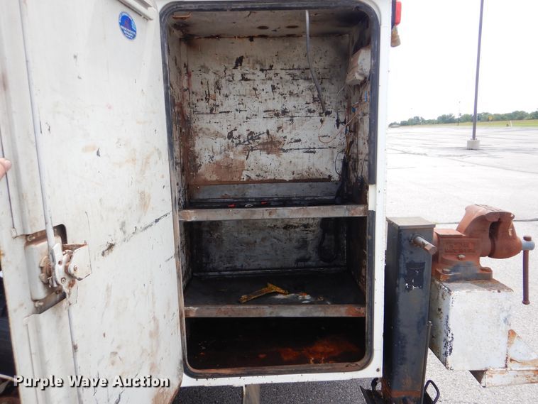 image for item HJ9827 1995 Peterbilt 330  utility bed truck with crane