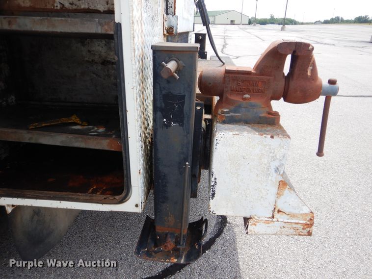 image for item HJ9827 1995 Peterbilt 330  utility bed truck with crane