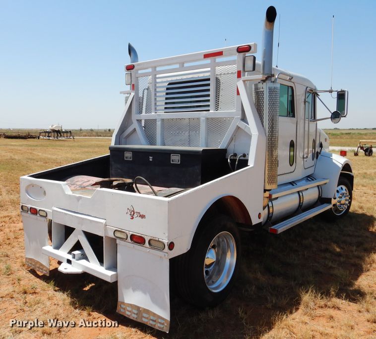 2004 Peterbilt 330 Crew Cab semi truck in Seminole, TX Item HO9772 sold Purple Wave