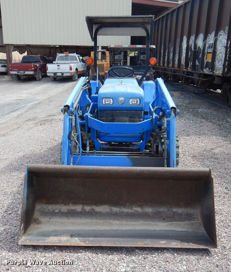 image for item HS9713 New Holland TC30  tractor