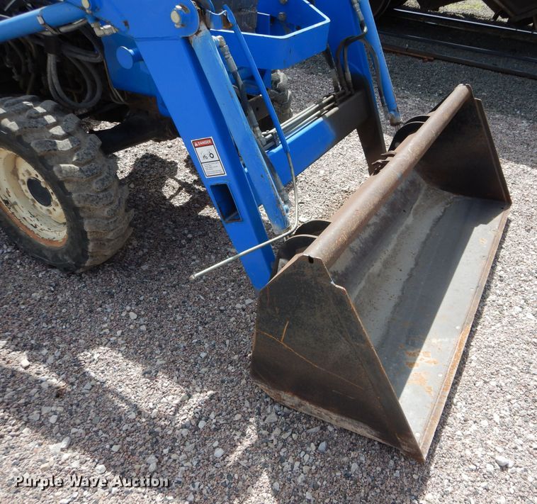 image for item HS9713 New Holland TC30  tractor